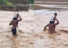 Telangana-flood-people-cross-dangerous-river
