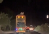 A Dog Tied On Top Of Lorry in National Highway 