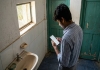 Neet-reexam-student-caught-cheating-mobile-in-flush-tank