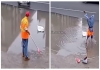 Cleaner-rescues-bag-from-flooded-street-video
