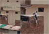 Woman-jumps-from-hotel-roof-escape-up