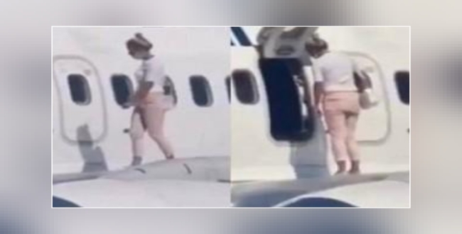 ukraine-woman-walks-onto-airplane-wing-complains-about-heat