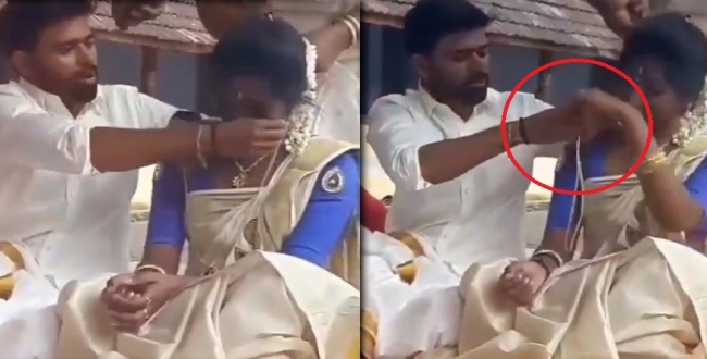 groom-struggle-to-knot-chain-on-bride-neck-video-goes-v