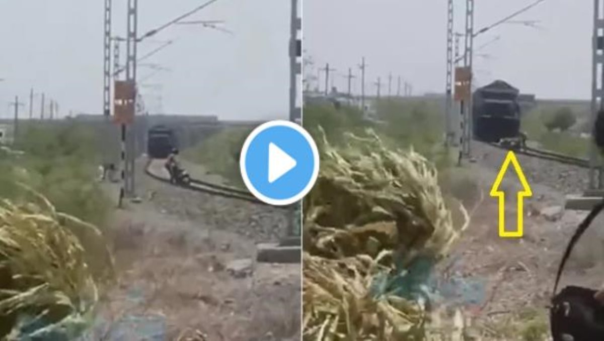 Gujarat scooter stuck in railway track viral video