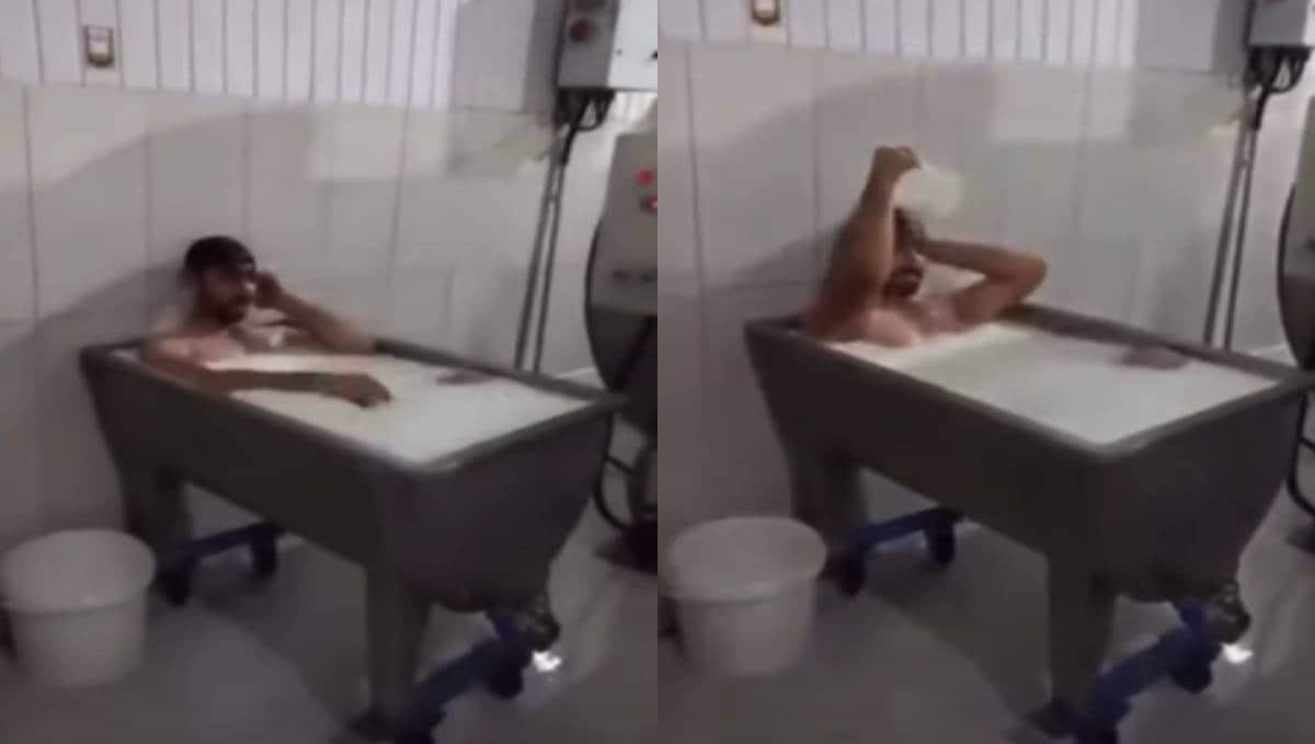 Worker Bathes In Milk At Dairy Plant
