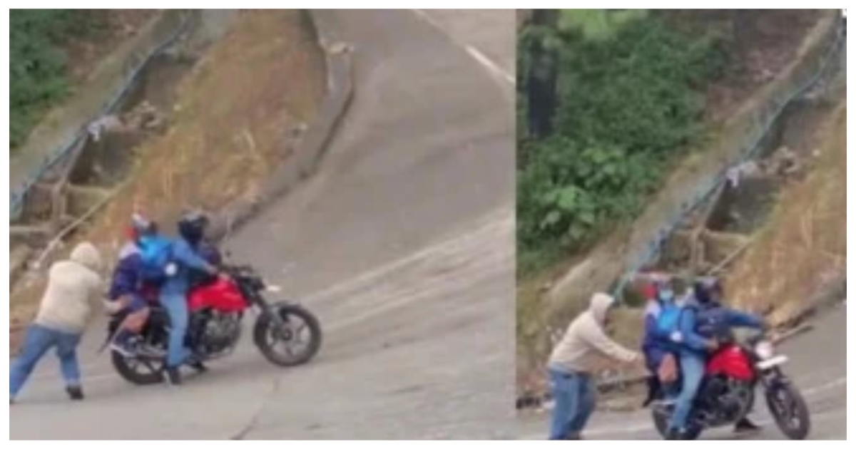 viral-video-man-saves-bike-rider-on-steep-hill-road