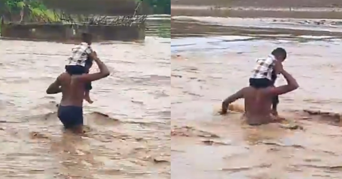 telangana-flood-people-cross-dangerous-river
