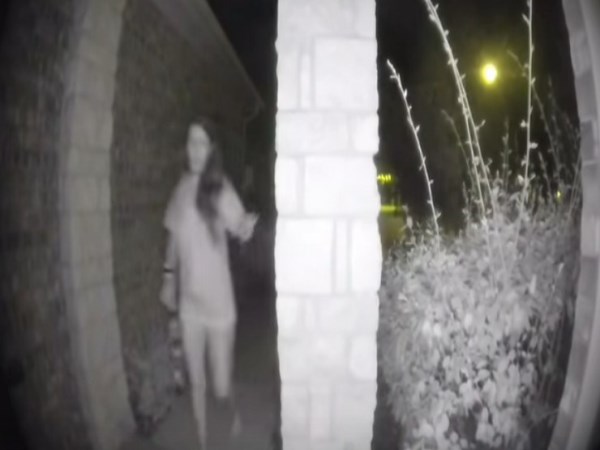 young girl rings calling bell at midnight in half nude