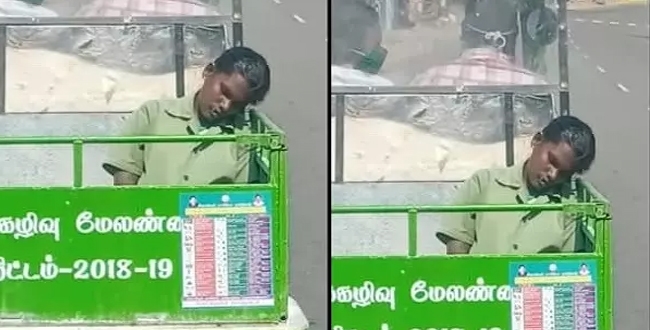 Female sanitation worker sleeping in garbage box due to heavy work