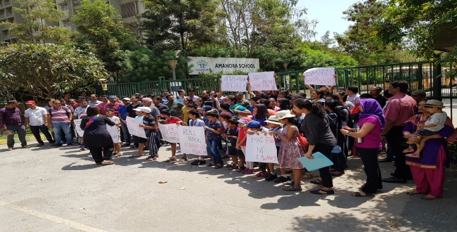 Parents protest against private school
