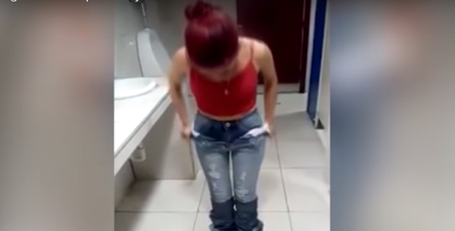 woman-caught-stealing-8-jeans-in-a-store-by-wearing-the