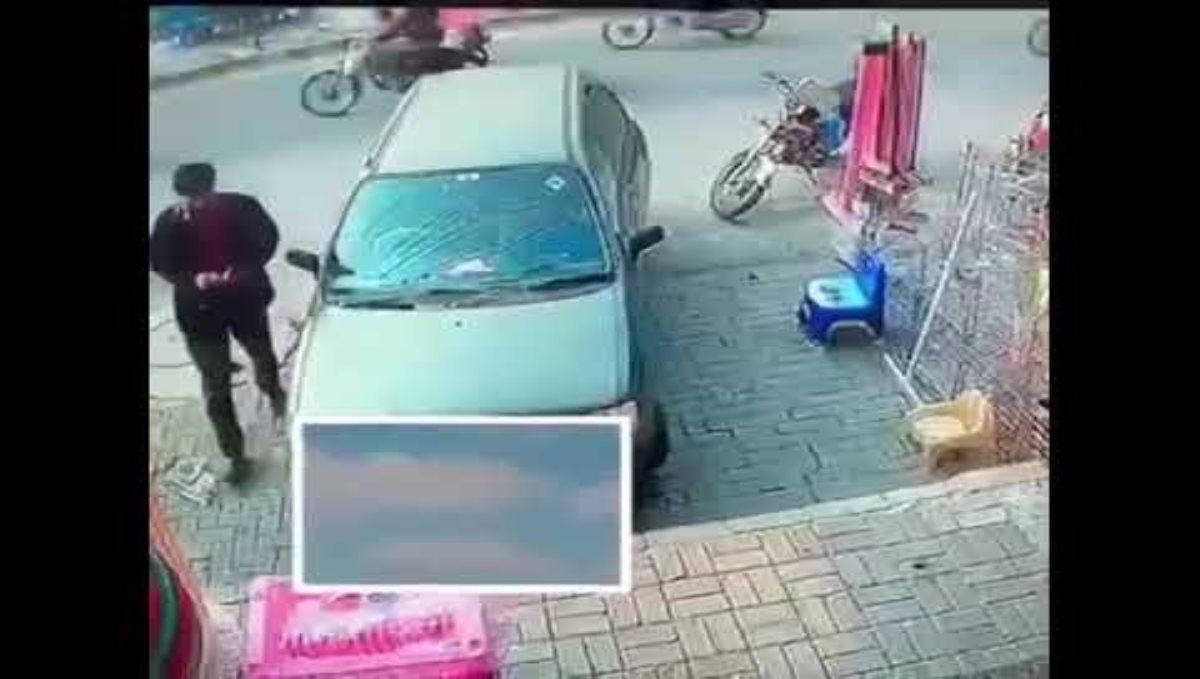 Man steeling laptop from car viral video