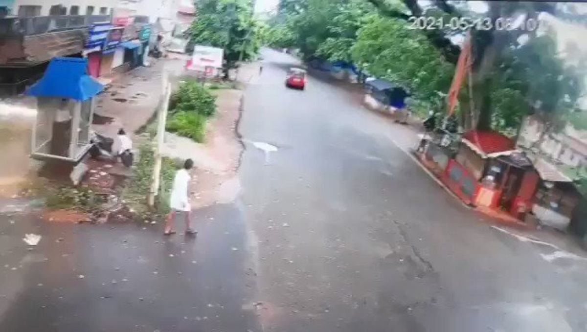 Kerala man great escape from fallen tree viral video