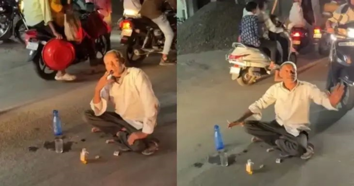 man-sitting-on-road-viral-video-public-concern