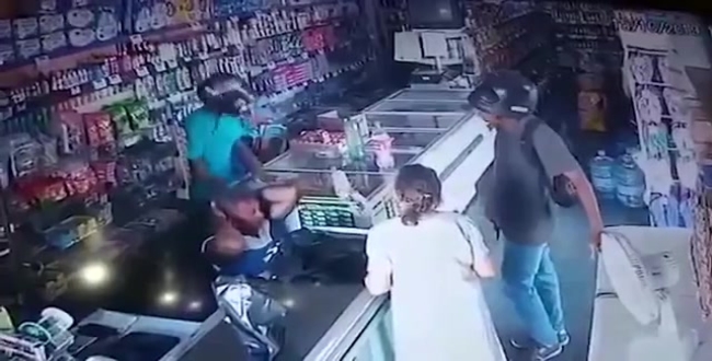 armed robber kisses elder women in pharmacy