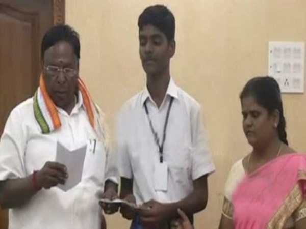 handicapped student helping to kerala