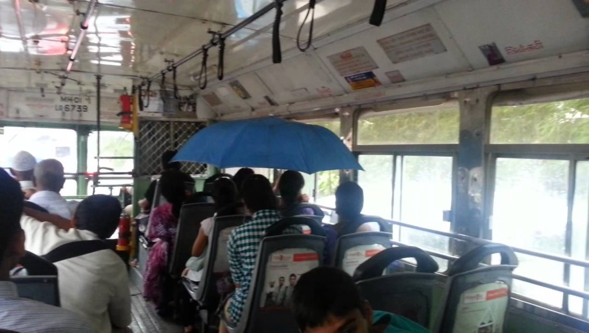 TN Bus driver driving bus with umbrella viral video