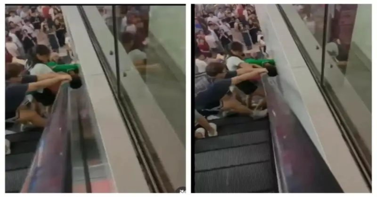 boy-stuck-escalator-wall-china