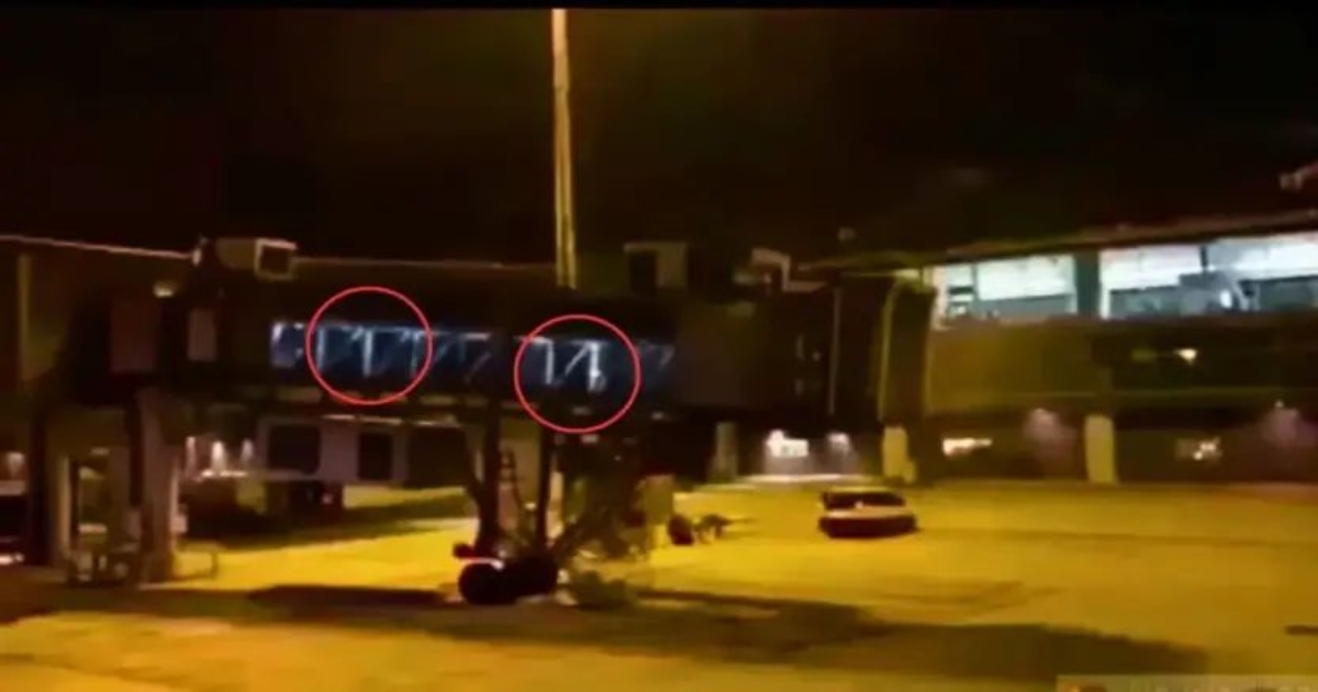 ghost-figures-airport-bridge-viral-video
