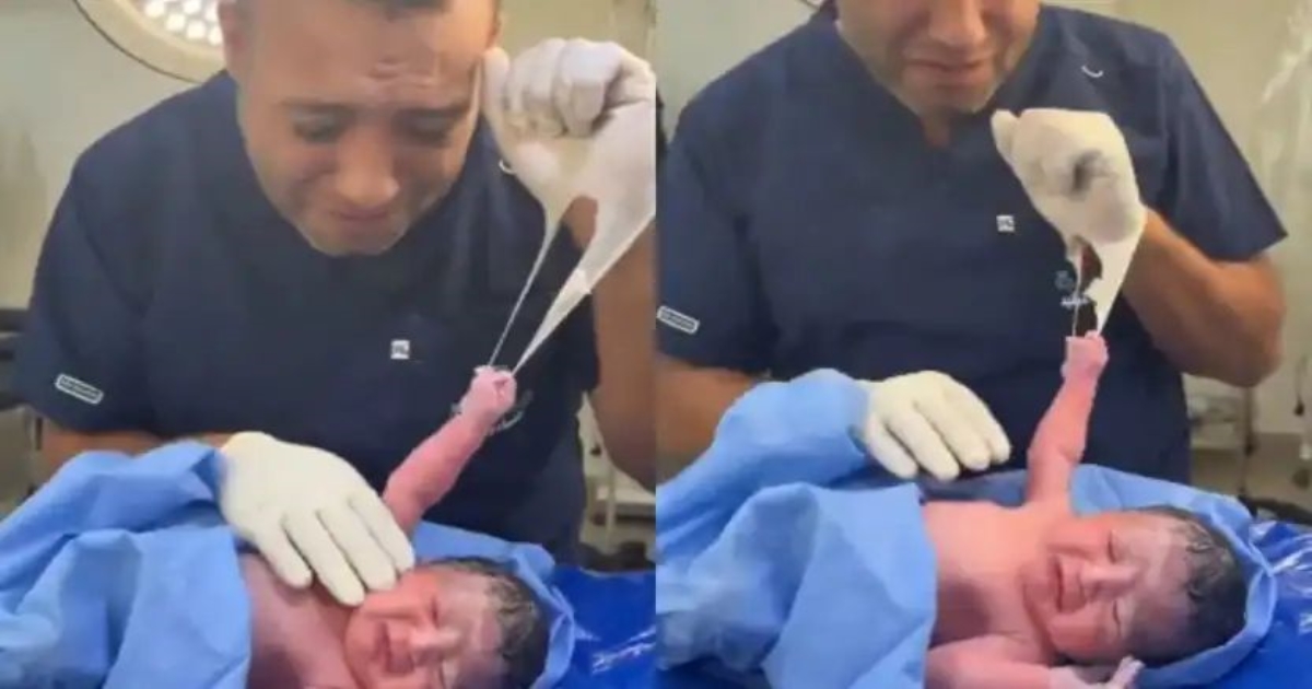 newborn-baby-holds-doctors-glove-viral-video