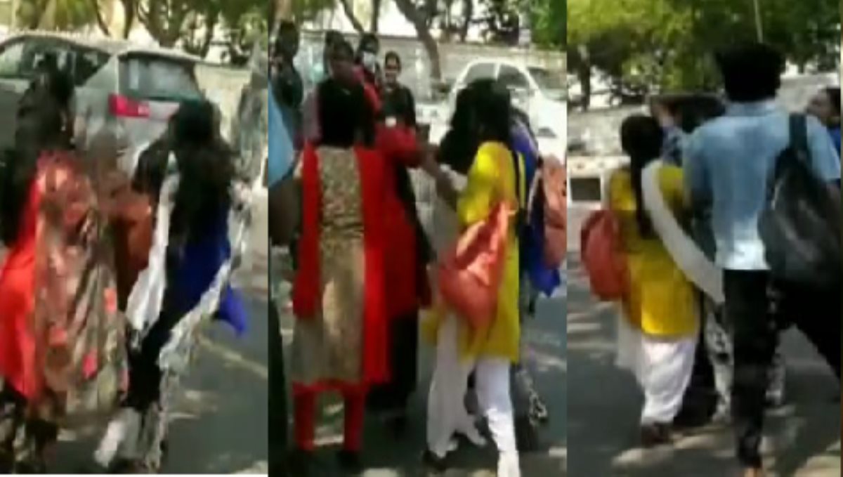 college students fight on road