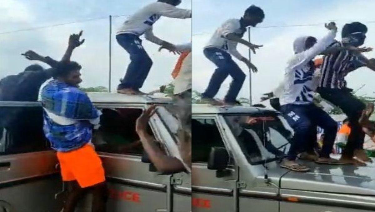 youngsters dance on police car