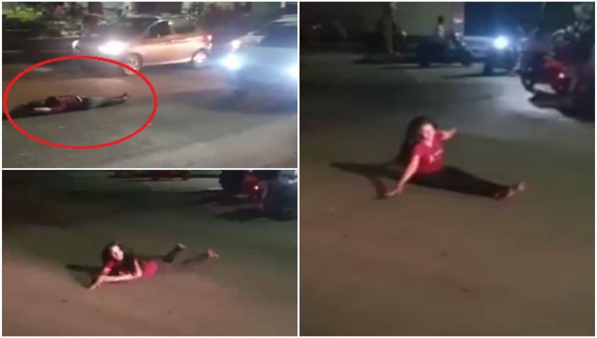 drunk-woman-rolls-around-and-sleeps-on-road-in-pune