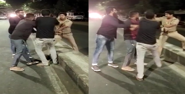 four men fight with single police