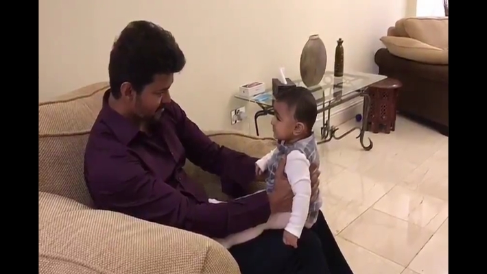 actir-vijay-playing-with-cute-baby