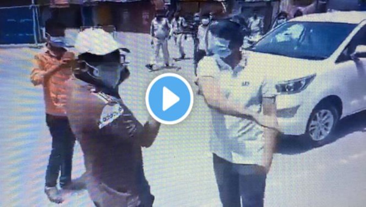 District collector slap a man on road viral video