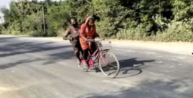 girl cycling with injuredd father in 1200 km
