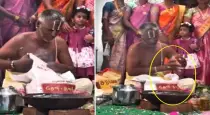 Viral-video-iyer-picks-items-from-wedding-stage