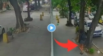 Viral-video-woman-falls-into-sinkhole-on-road