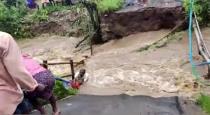 a Man Struggle Nilgiris Gudalur Rain Bridge Collapse 