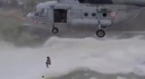 airforce soldiers rescue a man from river