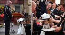 one-year-old-child-playing-at-father-funeral