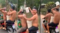 Two man bath while driving bike video goes viral