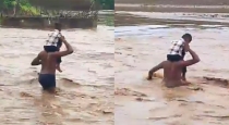 Telangana-flood-people-cross-dangerous-river