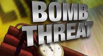 Bomb threatening to husband and wife