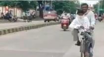 dad-105-km-drive-by-cycle-for-his-son-exam
