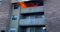 Former Marine catches boy thrown from deadly apartment fire
