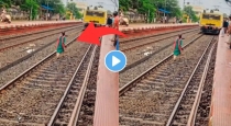 Woman-throws-stone-at-moving-train-video-viral