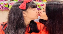 Aishwarya Rai Lip Kiss with Daughter 