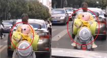 a-son-take-care-of-mother-in-traffic-signal-video-goes