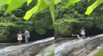 Lover-falls-in-waterfall-during-proposal