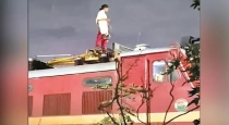Woman-climbs-tambaram-train-engine