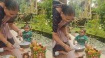 Grandma-tulsi-puja-kid-playing-dholam-viral-video