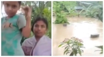 Assam-flood-mother-children-tree-rescue-video