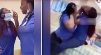 two-female-nurses-wrestle-on-the-ground-during-brawl-in