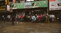 in Chennai Pulianthope Peoples Buy TasmaC Liquor during the Amid on Cyclone Fengal 